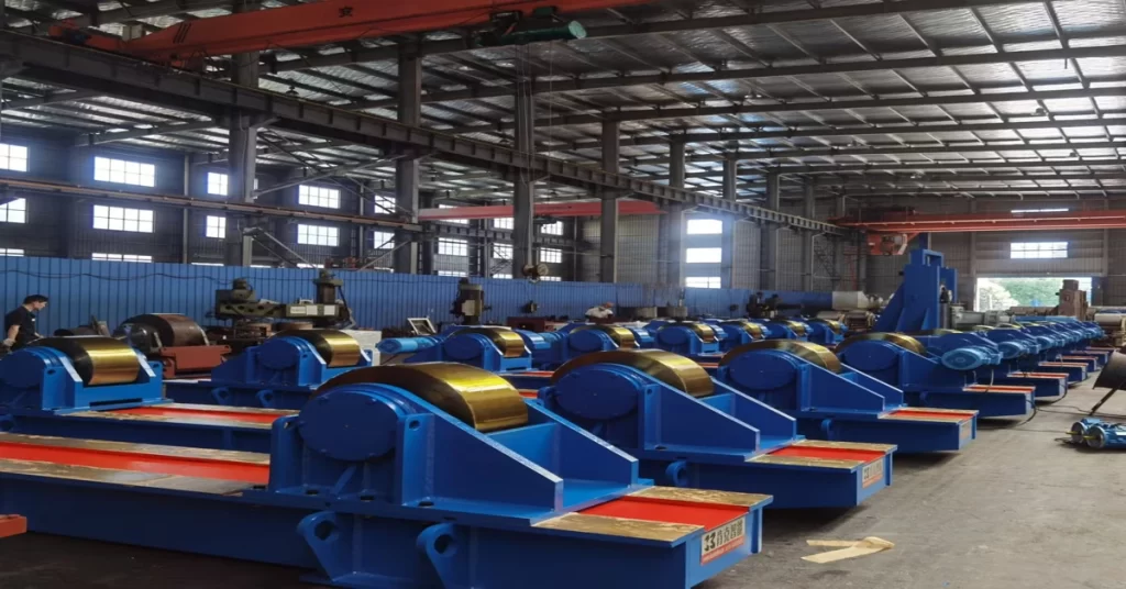 Welding pipe rotator machine rotating cylindrical pipe during industrial fabrication process