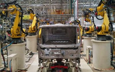 Industrial robotic welding automation system in heavy fabrication workshop